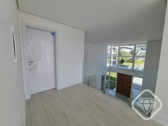 Imagem Casa de Condomínio com 4 Quartos à Venda,  em Vila Nova - Porto Alegre