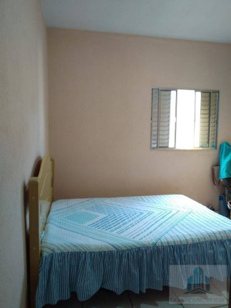 Imagem Sobrado com 5 Quartos à Venda, 210 m²