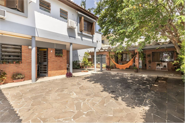 Imagem Casa com 4 Quartos à Venda,  em Três Figueiras - Porto Alegre