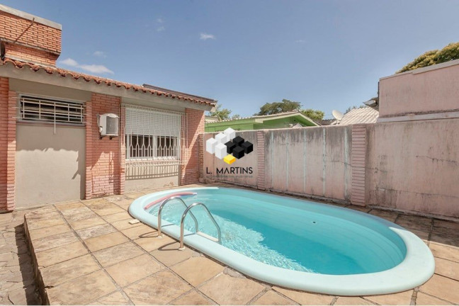 Imagem Casa com 4 Quartos à Venda, 381 m² em Camaquã - Porto Alegre Imagem Casa com 4 Quartos à Venda, 381 m² em Camaquã - Porto Alegre