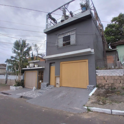 Imagem Casa com 8 Quartos à Venda, 300 m² em Cavalhada - Porto Alegre