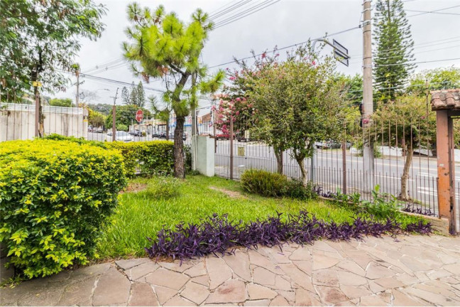 Imagem Casa com 4 Quartos à Venda, 313 m² em Cavalhada - Porto Alegre