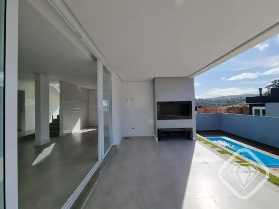Imagem Casa de Condomínio com 4 Quartos à Venda,  em Vila Nova - Porto Alegre