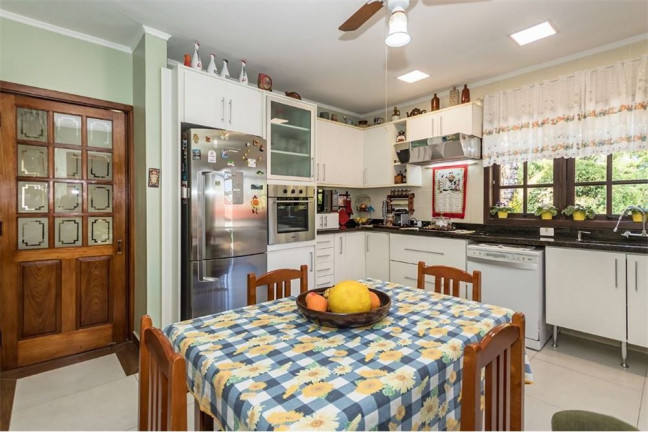 Imagem Casa com 4 Quartos à Venda, 525 m² em Jardim Sabará - Porto Alegre Imagem Casa com 4 Quartos à Venda, 525 m² em Jardim Sabará - Porto Alegre
