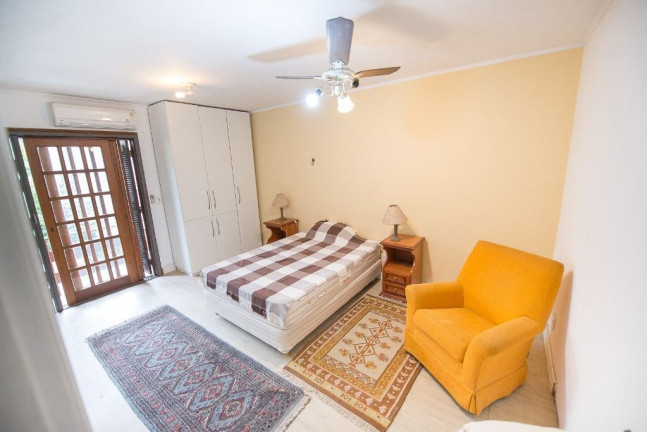 Imagem Casa com 4 Quartos à Venda, 272 m² em Rio Branco - Porto Alegre