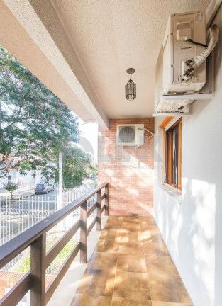 Imagem Sobrado com 3 Quartos à Venda, 316 m² em Jardim Lindóia - Porto Alegre