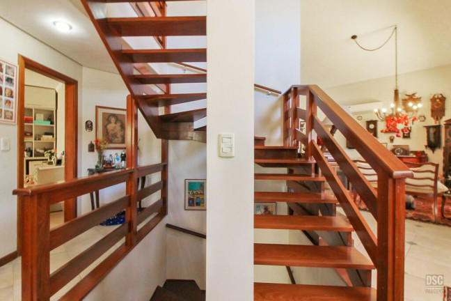 Imagem Casa de Condomínio com 3 Quartos à Venda, 389 m² em Vila Nova - Porto Alegre
