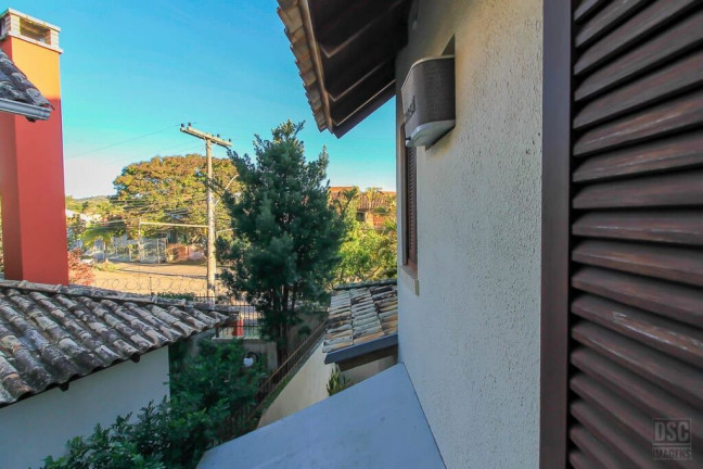 Imagem Casa de Condomínio com 3 Quartos à Venda, 266 m² em Ipanema - Porto Alegre