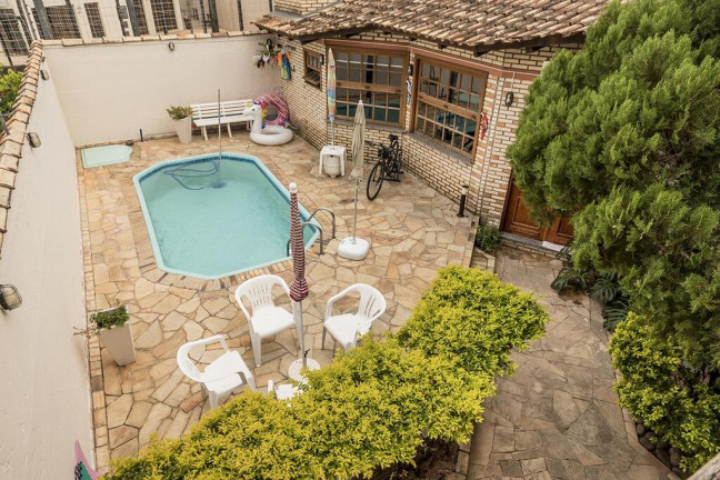 Imagem Casa com 3 Quartos à Venda, 219 m² em Cavalhada - Porto Alegre
