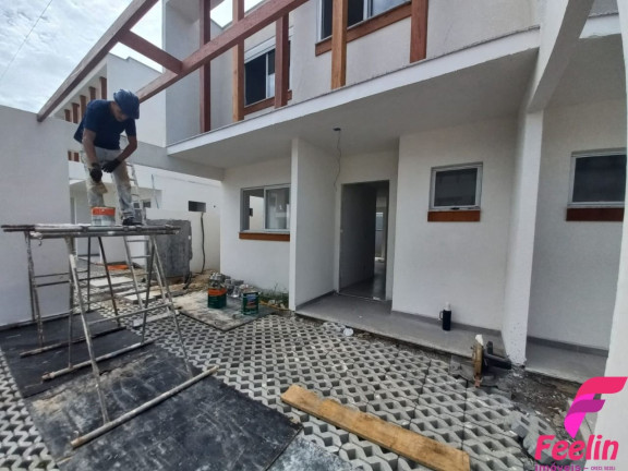 Imagem Casa de Condomínio com 3 Quartos à Venda, 96 m² em Morro Das Pedras - Florianópolis