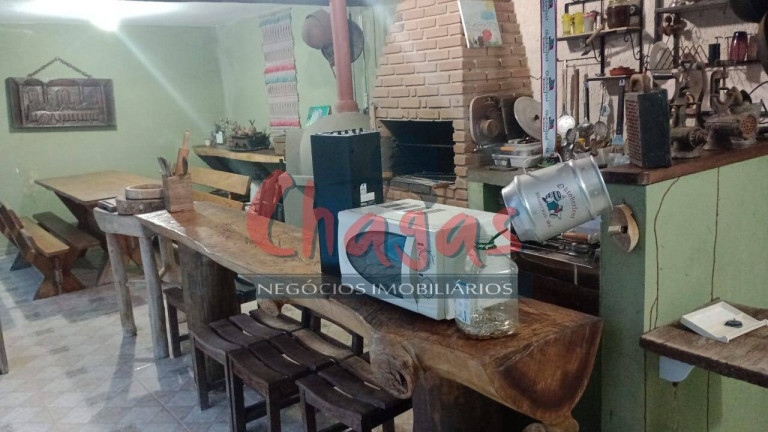 Imagem Casa com 4 Quartos para Alugar, 161 m² em Martim De Sá - Caraguatatuba