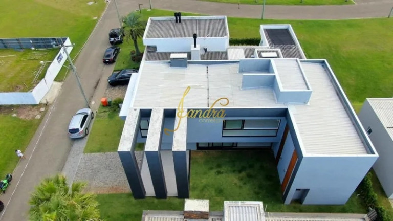 Imagem Casa de Condomínio com 5 Quartos à Venda, 310 m² em Zona Nova - Capão Da Canoa