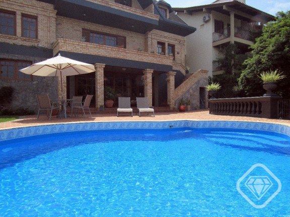 Imagem Casa de Condomínio com 4 Quartos à Venda, 550 m² em Cavalhada - Porto Alegre