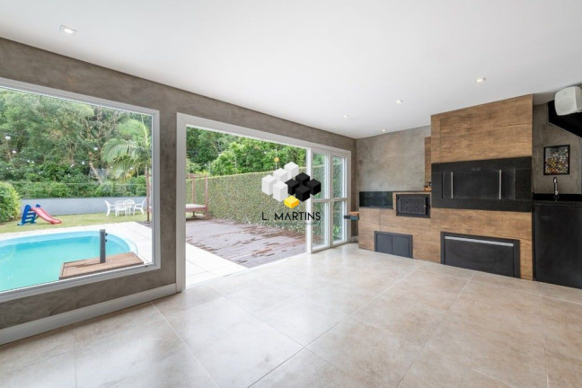 Imagem Casa de Condomínio com 3 Quartos à Venda, 320 m² em Vila Nova - Porto Alegre Imagem Casa de Condomínio com 3 Quartos à Venda, 320 m² em Vila Nova - Porto Alegre