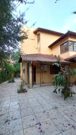 Imagem Casa com 4 Quartos à Venda, 400 m² em Centro - Viamão