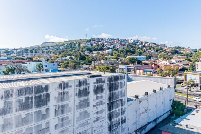 Imagem Apartamento com 2 Quartos à Venda, 55 m² em Cavalhada - Porto Alegre