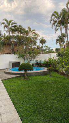 Imagem Casa com 4 Quartos à Venda, 332 m² em Flórida - Praia Grande Imagem Casa com 4 Quartos à Venda, 332 m² em Flórida - Praia Grande