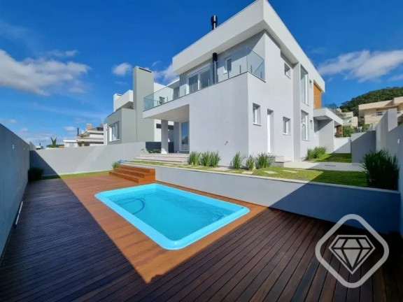 Imagem Casa de Condomínio com 4 Quartos à Venda,  em Vila Nova - Porto Alegre