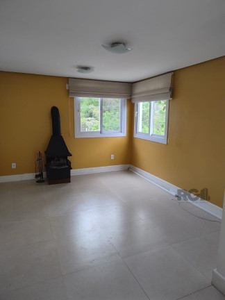 Imagem Sobrado com 3 Quartos à Venda, 230 m² em Lomba Do Pinheiro - Porto Alegre