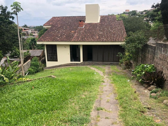 Imagem Casa com 4 Quartos à Venda, 242 m² em Cascata - Porto Alegre
