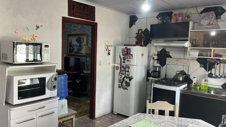 Imagem Casa com 4 Quartos à Venda, 100 m² em Cohab - Viamão