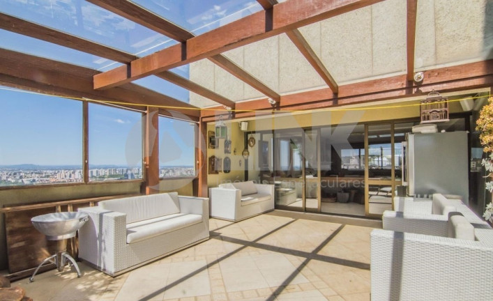 Imagem Imóvel com 4 Quartos à Venda, 600 m² em Três Figueiras - Porto Alegre