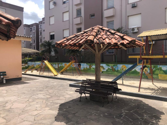Imagem Apartamento com 2 Quartos à Venda, 63 m² em Protasio - Porto Alegre