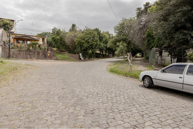 Imagem Casa com 4 Quartos à Venda, 170 m² em Vila Nova - Porto Alegre