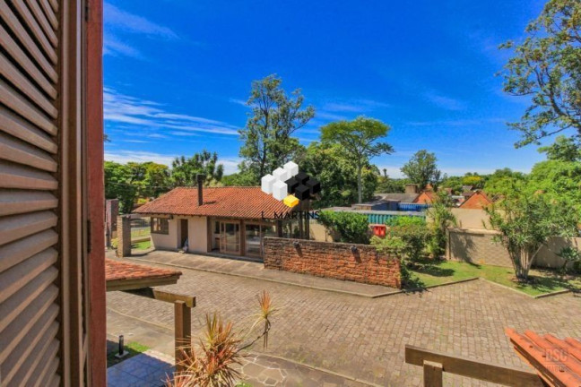 Imagem Casa com 4 Quartos à Venda, 117 m² em Cavalhada - Porto Alegre
