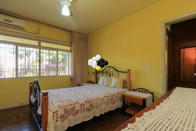 Imagem Casa com 7 Quartos à Venda, 330 m² em Nonoai - Porto Alegre Imagem Casa com 7 Quartos à Venda, 330 m² em Nonoai - Porto Alegre