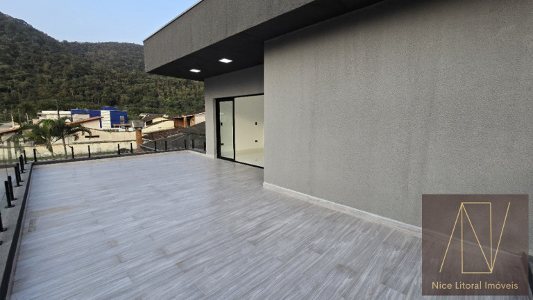 Imagem Sobrado com 4 Quartos à Venda, 300 m² em Massaguaçu - Caraguatatuba