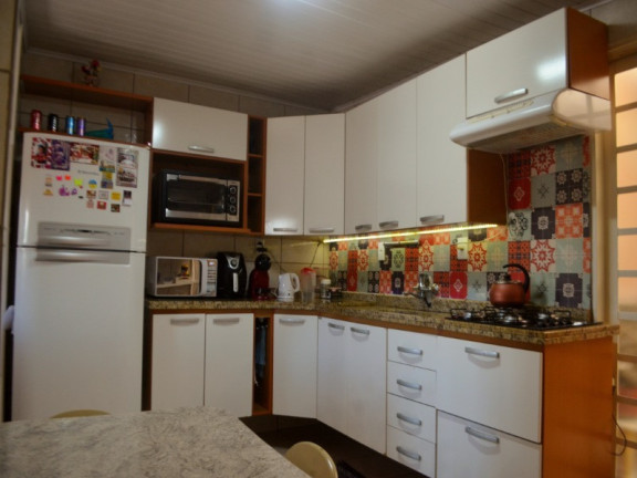 Imagem Casa com 4 Quartos à Venda, 90 m² em Parque Santa Fé - Porto Alegre Imagem Casa com 4 Quartos à Venda, 90 m² em Parque Santa Fé - Porto Alegre