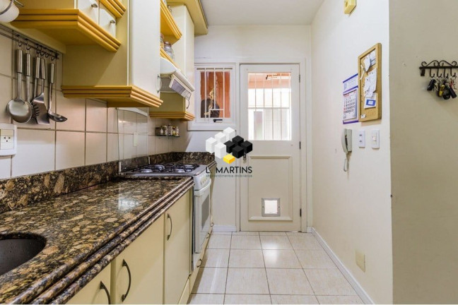 Imagem Casa de Condomínio com 3 Quartos à Venda, 109 m² em Teresópolis - Porto Alegre