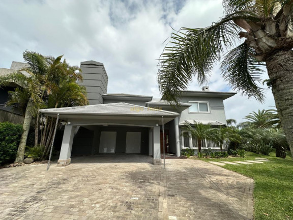 Imagem Casa com 5 Quartos à Venda, 430 m² em Condominio Atlantida Ilhas Park - Xangri-lá Imagem Casa com 5 Quartos à Venda, 430 m² em Condominio Atlantida Ilhas Park - Xangri-lá