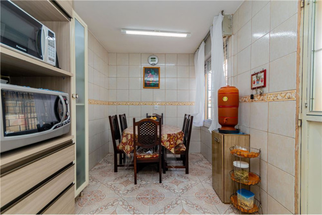 Imagem Casa com 3 Quartos à Venda, 139 m² em Santa Tereza - Porto Alegre