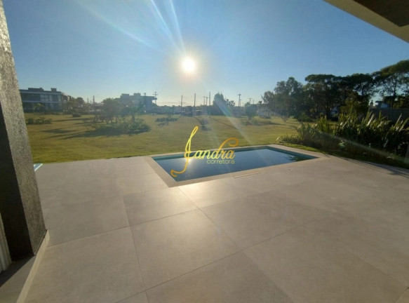Imagem Casa de Condomínio com 4 Quartos à Venda, 247 m² em Centro - Xangri-la