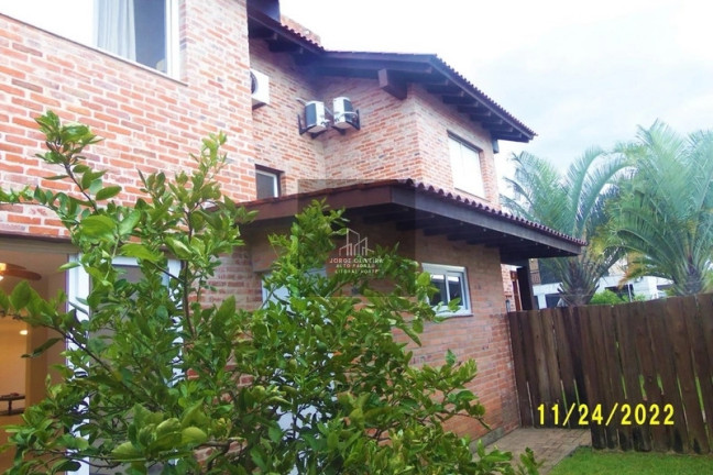 Imagem Casa de Condomínio com 5 Quartos à Venda,  em Atlântida - Xangri-lá