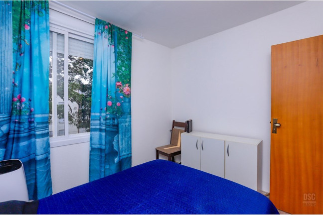 Imagem Imóvel com 2 Quartos à Venda, 46 m² em Cavalhada - Porto Alegre