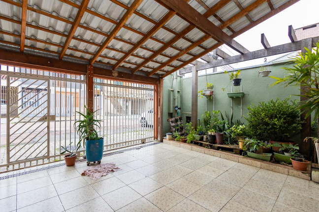 Imagem Sobrado com 4 Quartos à Venda, 139 m² em Campo Comprido - Curitiba