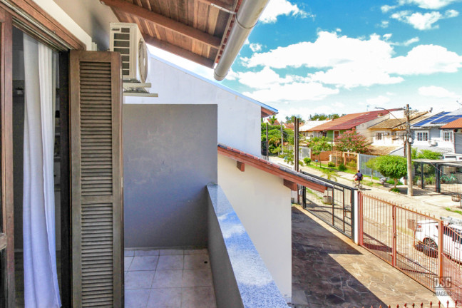 Imagem Casa com 2 Quartos à Venda, 82 m² em Hípica - Porto Alegre