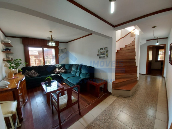 Imagem Sobrado com 5 Quartos à Venda, 380 m² em Jardim Lindóia - Porto Alegre