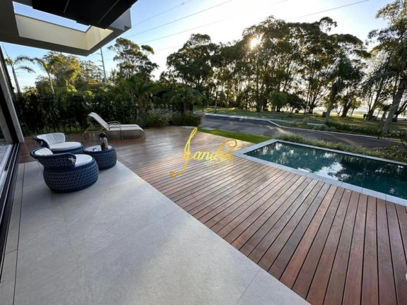Imagem Casa de Condomínio com 6 Quartos à Venda, 588 m² em Zona Nova - Capão Da Canoa