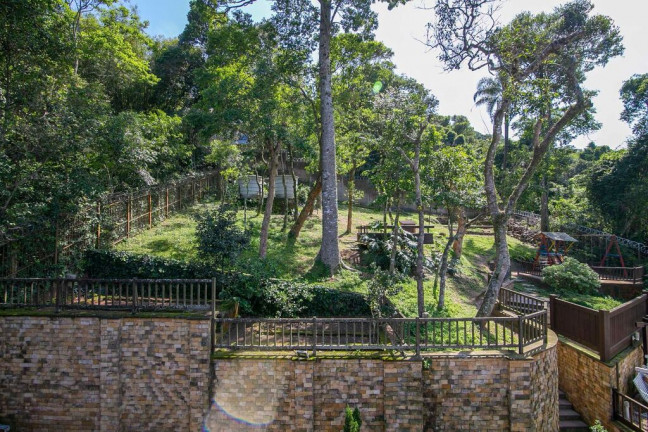 Imagem Casa de Condomínio com 4 Quartos à Venda, 477 m² em Pedra Redonda - Porto Alegre