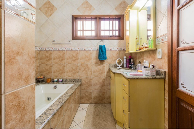 Imagem Casa com 4 Quartos à Venda, 395 m² em Jardim Planalto - Porto Alegre