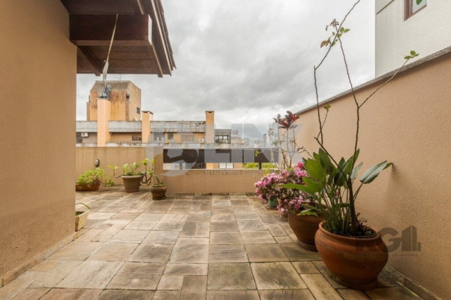 Imagem Imóvel com 3 Quartos à Venda, 275 m² em Rio Branco - Porto Alegre