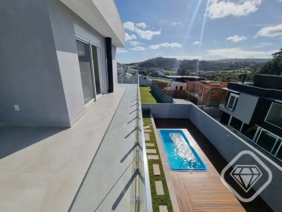 Imagem Casa de Condomínio com 4 Quartos à Venda,  em Vila Nova - Porto Alegre