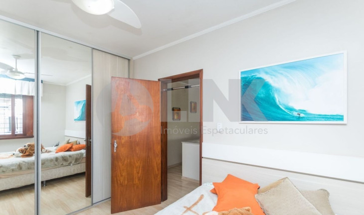 Imagem Sobrado com 3 Quartos à Venda, 316 m² em Jardim Lindóia - Porto Alegre