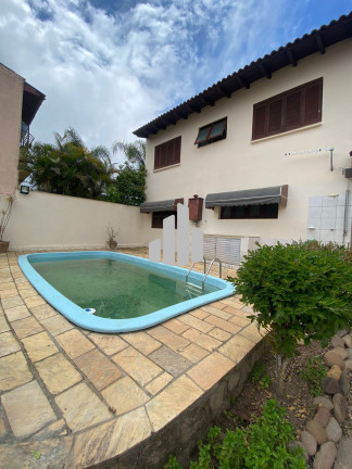 Imagem Casa com 3 Quartos à Venda, 260 m² em Guarujá - Porto Alegre