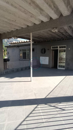 Imagem Casa com 5 Quartos à Venda, 218 m²