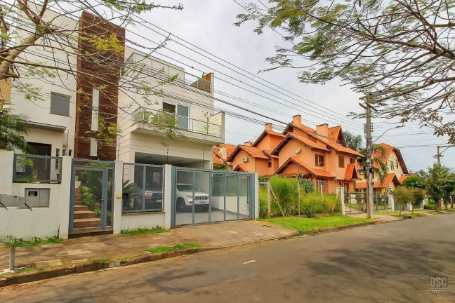 Imagem Casa com 3 Quartos à Venda, 290 m² em Guarujá - Porto Alegre Imagem Casa com 3 Quartos à Venda, 290 m² em Guarujá - Porto Alegre